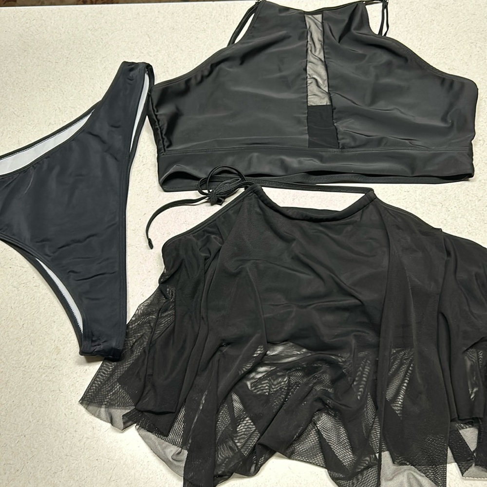Swimsuit bottoms and two tops. SHEIN 2xl set and one top with flowy covering 1XL